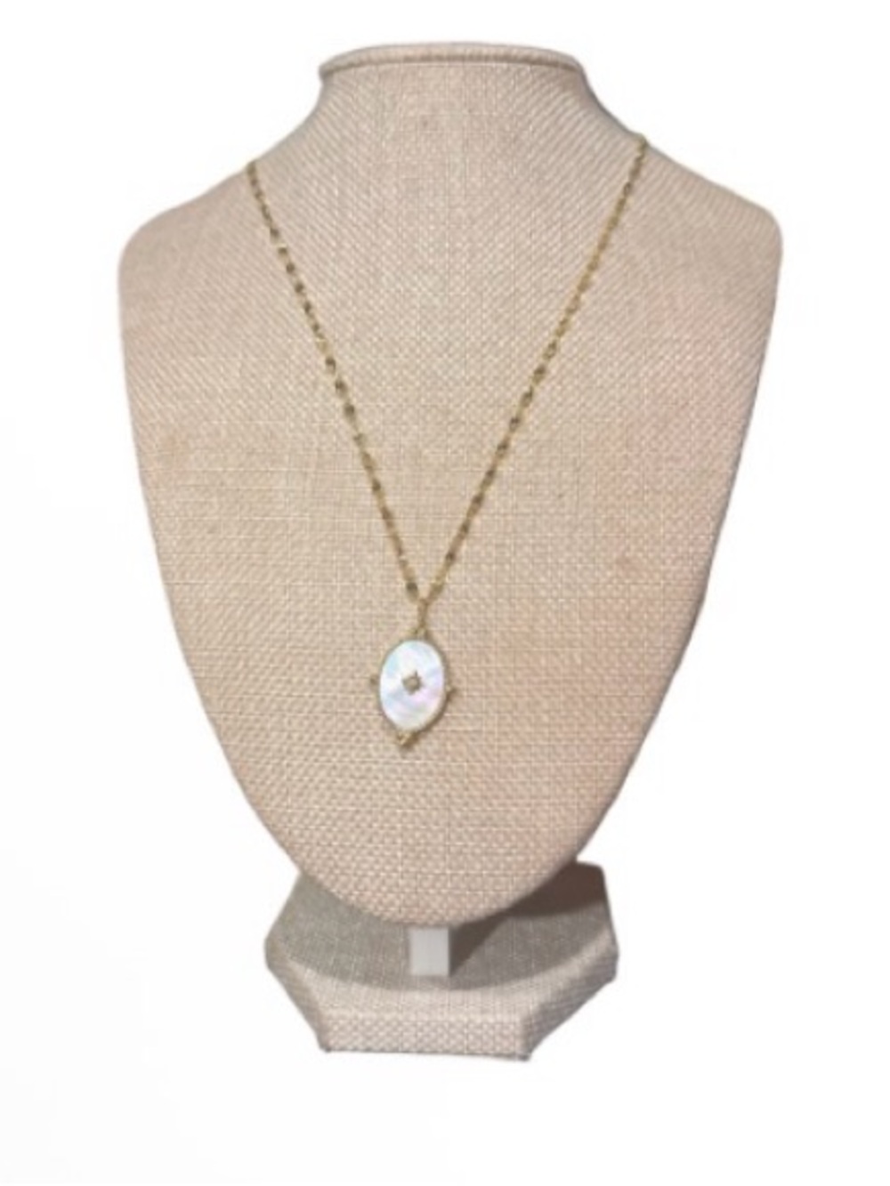 Plunder gold tone mother of pearl oval starburst necklace